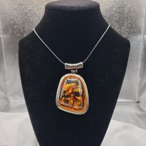 Elegant Silver and Amber Pendant Necklace